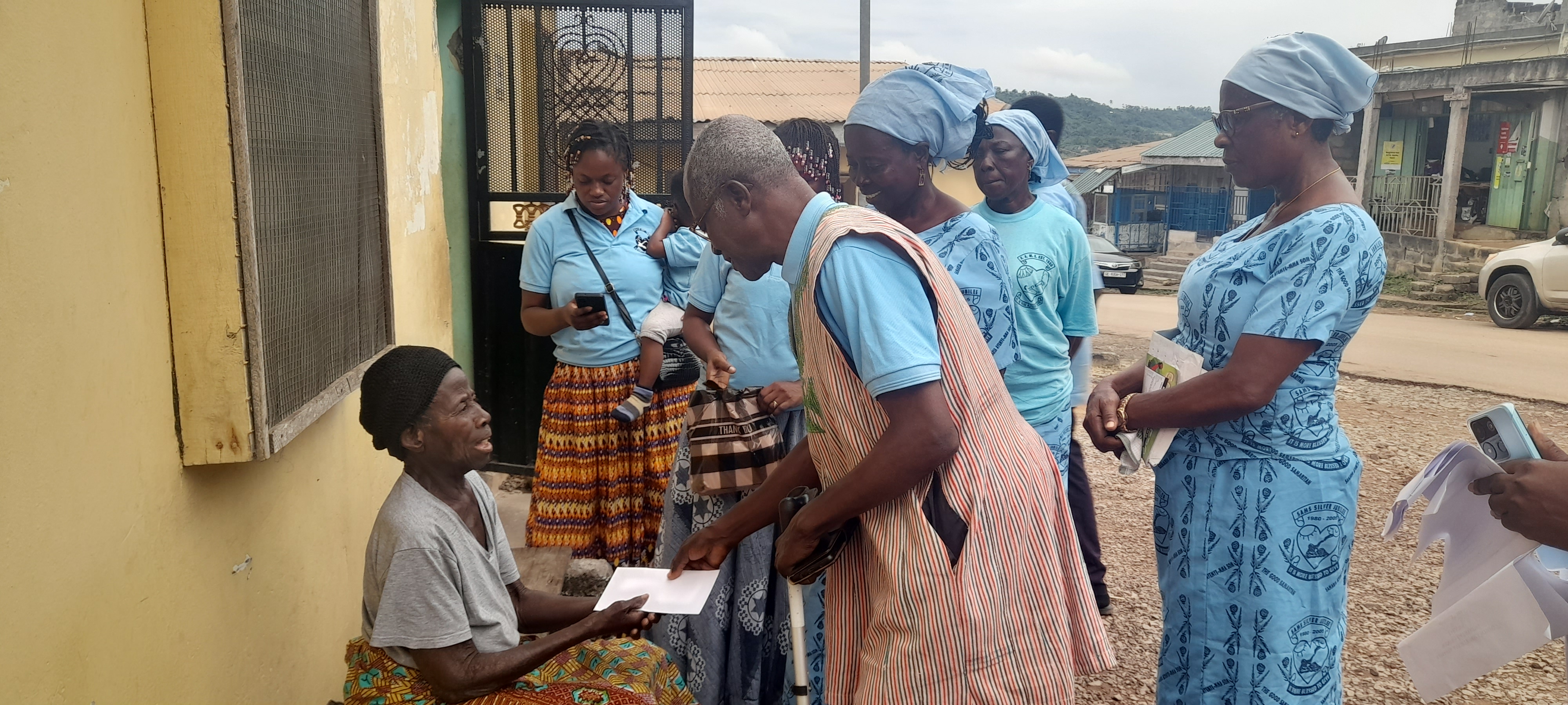 SAMS visit to a widow at Tarkwa